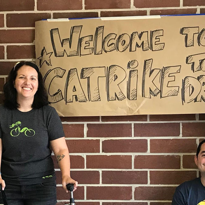 Andrea Peet, triker with ALS who participated in 50 marathons in each state, visits the Catrike factory in Orlando, Florida.