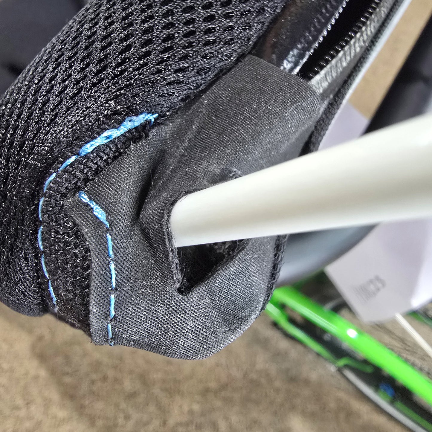 An ICE flag pole mounted in the ICE tube plug with hole under a slit in the seat fabric.