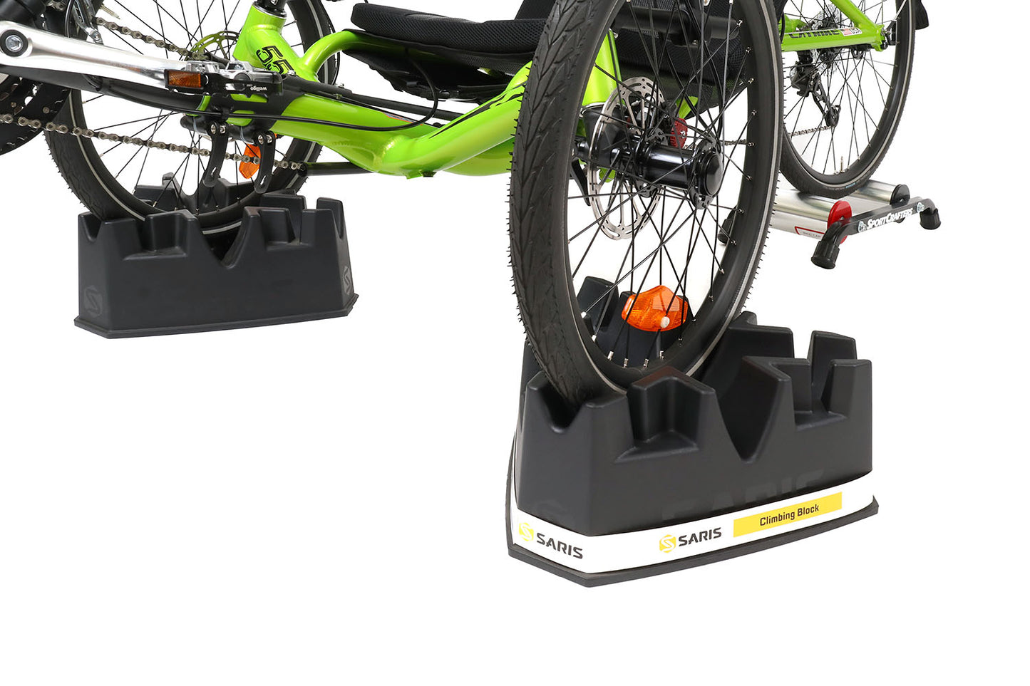 Front quarter view of the Saris Riser Climbing Training Blocks, shown with a trike mounted, on a white background.