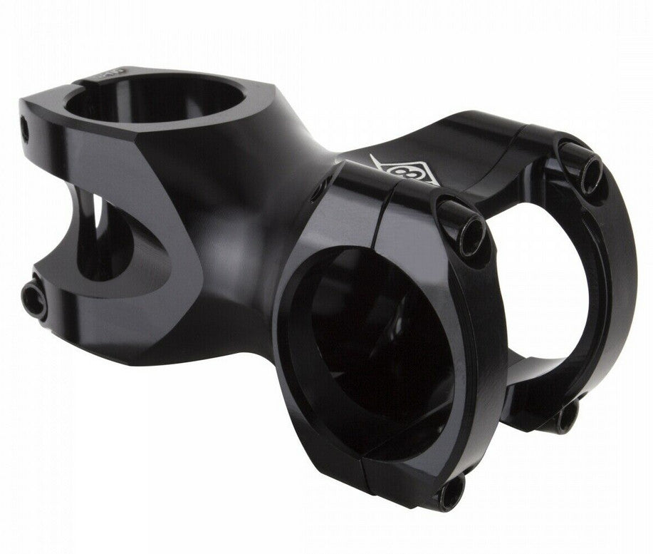 Black CNC stem for bicycles, with a polished finish and a 4-bolt front loading one-piece faceplate design.