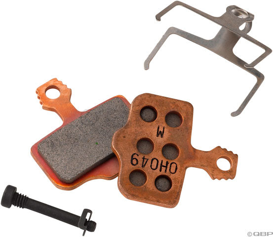 SRAM Level, Elixir, and 2-Piece Road Sintered Compound Steel Backed Disc Brake Pads showing the back of the brakes which is bronze