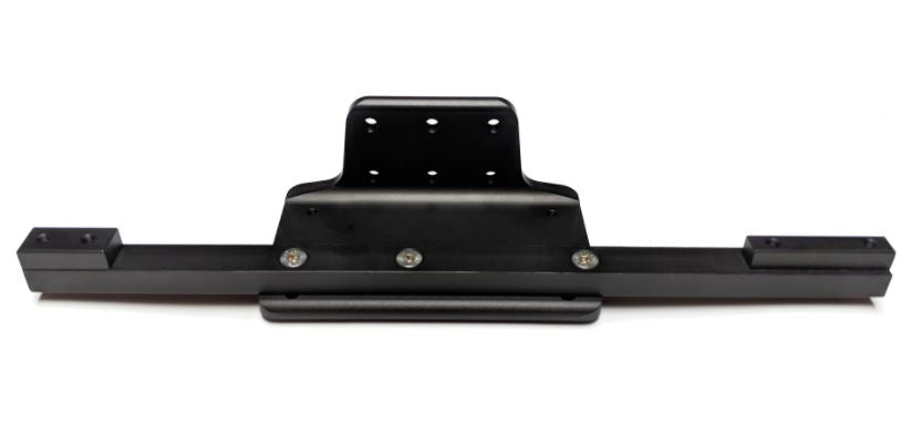 Black metal rail mounted to black metal adapter plate with 3 silver bolts