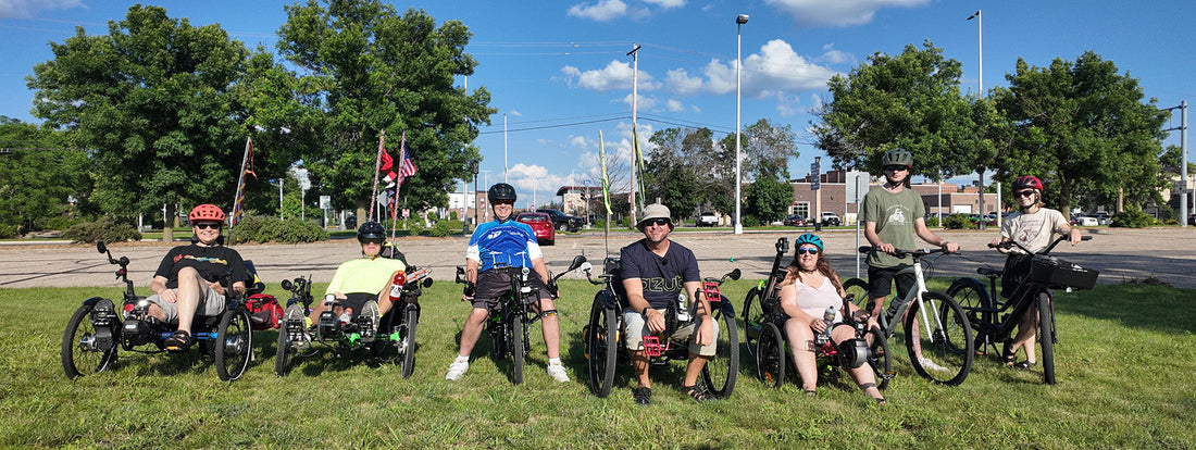 Event riders line up for a photo after the ride.
