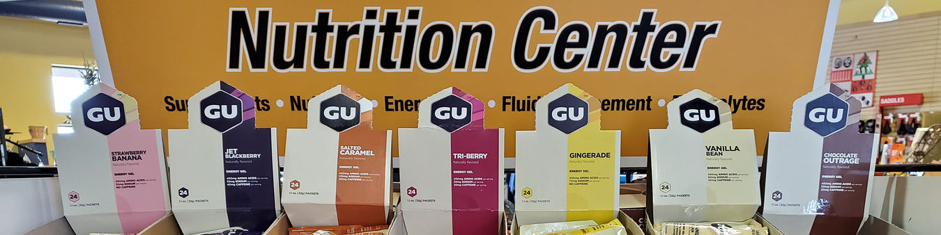 Image of a Nutrition Center display featuring multiple flavors oof GU, an energy gel.