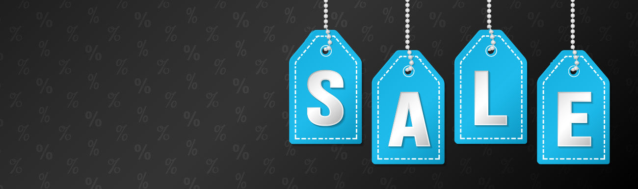 A black background with percent signs with blue tag images with white text spelling out the word "SALE".