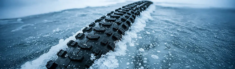 Image of a bike tire popping up through ice.