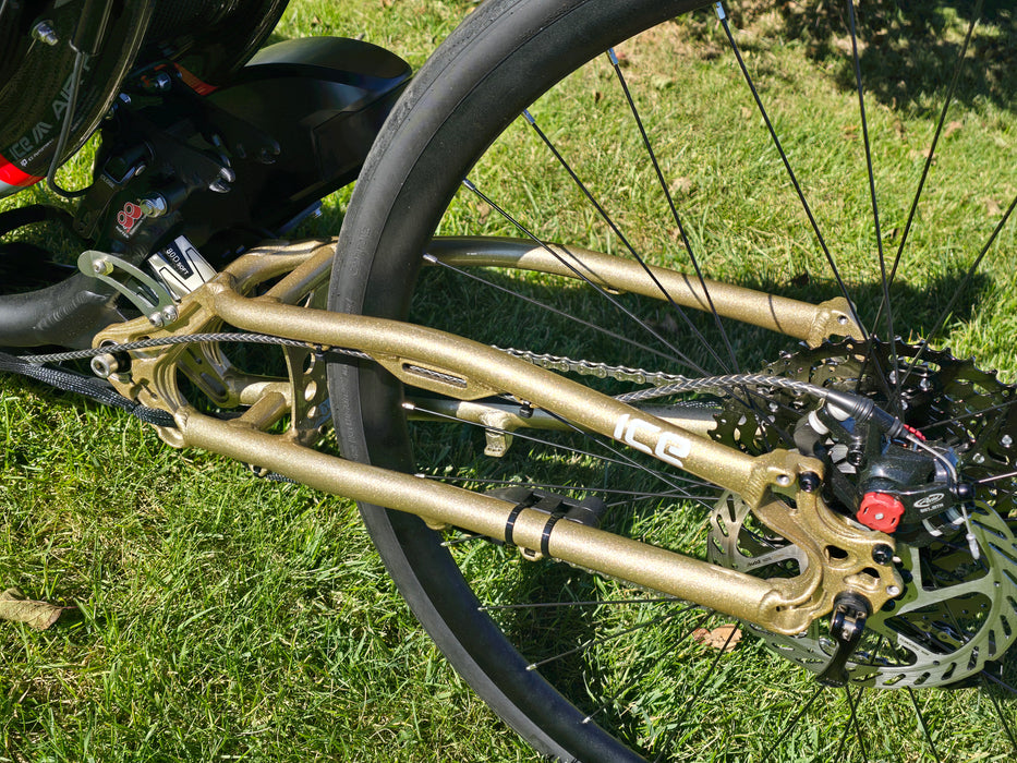 ICE Sprint X 700 Closeup of drivetrain and brakes, highlighting the new gold color.