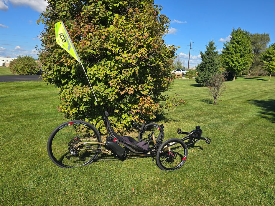 ICE Sprint X 700 on a grass field, up against a tree.