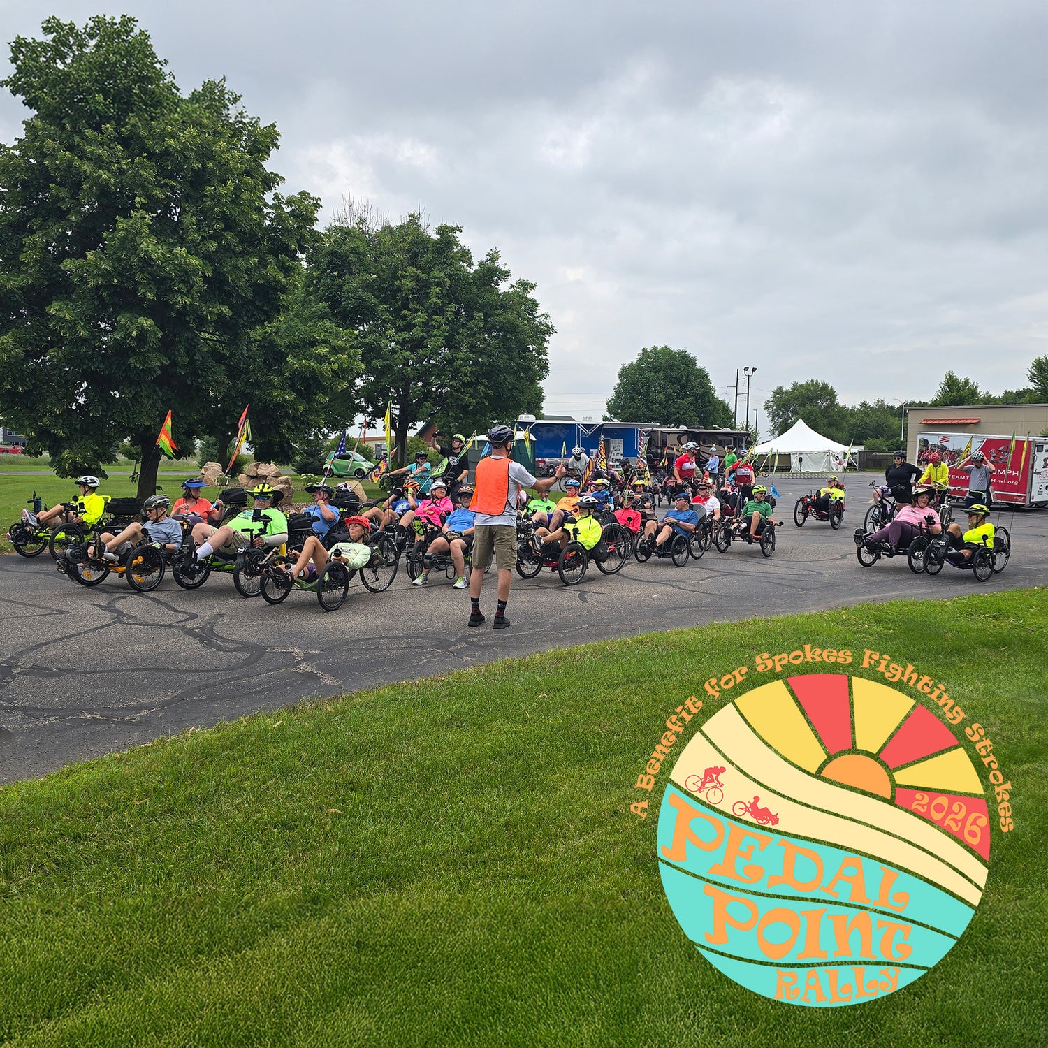 A group of riders line up to ride and the Pedal Point Rally.