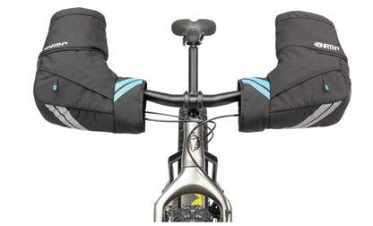 Bicycle handlebar with black 45NRTH Cobrafist pogies installed on a white background