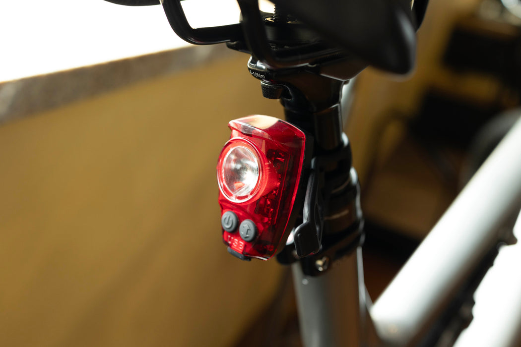 Cygolite Hotshot Pro 200 USB Tail Light mounted to Mountain Bike seat stem