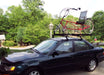 Atoc Bike Topper Auto Rack Tray on a black car with bike on top
