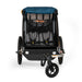 Burley Encore X Child Trailer Blue front angle with protective cover flipped up to reveal interior seats and belts