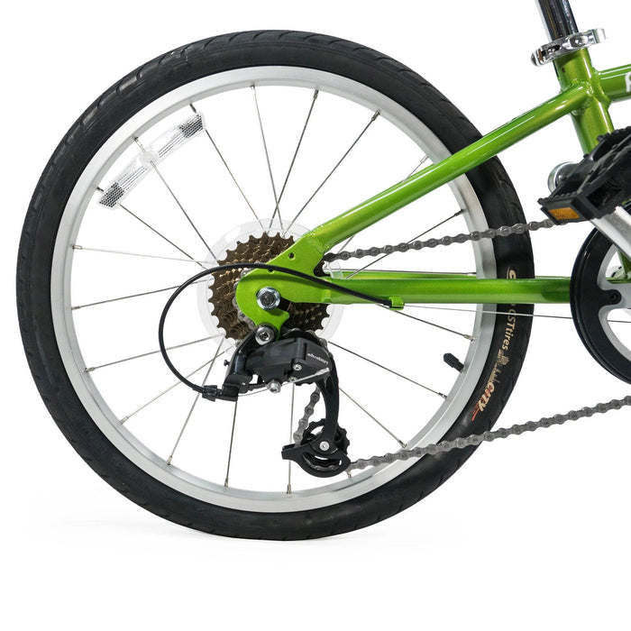 Burley Piccolo Green Trailer Cycle rear wheel and shifter closeup studio image