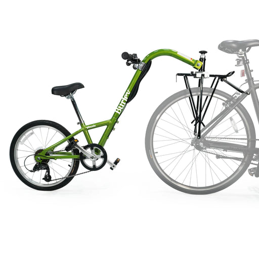 Burley Piccolo Green Trailer Cycle mounted to bike studio image side