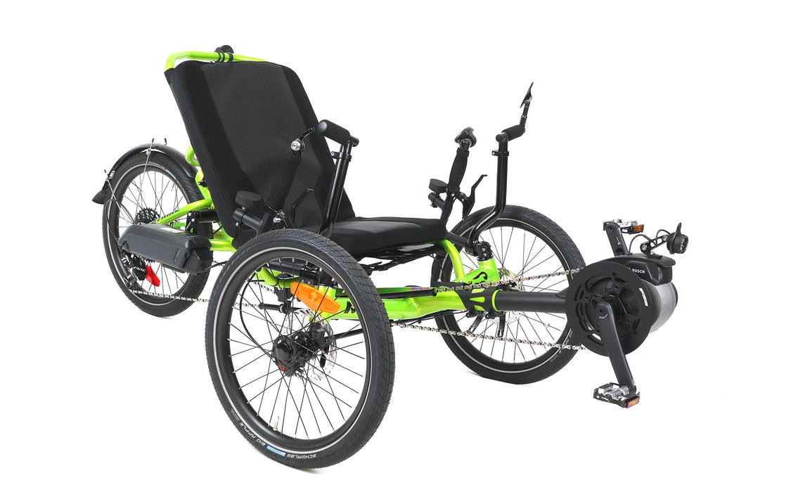 Catrike Max Recumbent Trike with Bosch motor, 20 inch wheels, stand up assist bars in Eon Green frame, front right angle view of motor and front wheels.