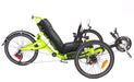 Right profile studio view of a Catrike Trail recumbent trike with a neon yellow frame, silver crank arms, black boom, black seat pad, three 20 inch wheels and a black rear fender.