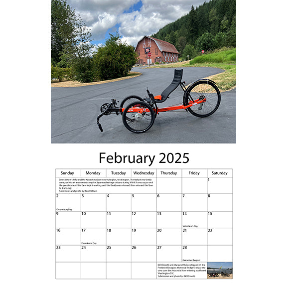 February 2025 Features an orange 
Greenspeed trike in the mountains in Washington in front of a red barn. 