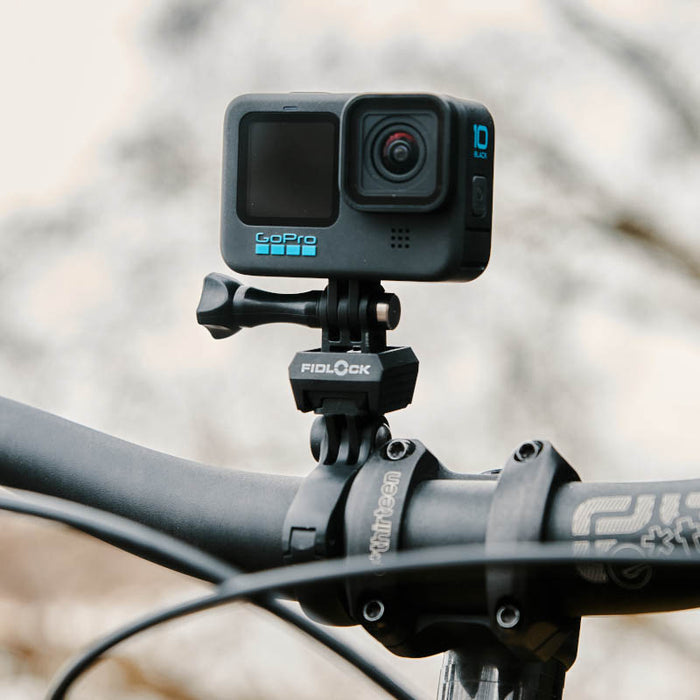 GoPro mounted to Fidlock PINCLIP Action Cam Mount on bike handlebars