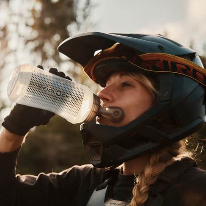 Mountain biker drinking out of Fidlock TWIST 750 Compact Single Bottle