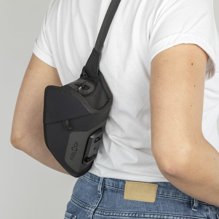 Fidlock TWIST Essential Medium Bag Black being worn as a over the shoulder bag