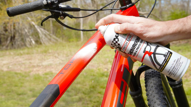 Finish Line Showroom Ceramic Polish and Protectant 12oz Aerosol being used to clean TREK bike frame