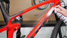 Finish Line Showroom Ceramic Polish and Protectant 12oz Aerosol being used to clean TREK bike frame