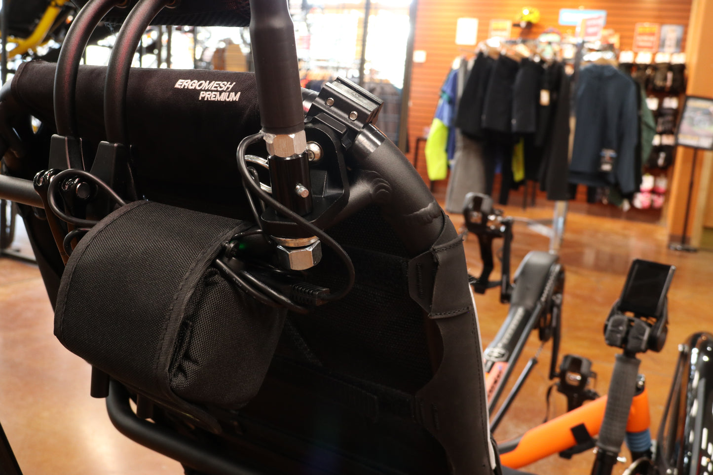 View of the Glowwhips 360 Degree Adjustable Bar Mount, shown mounted on a trike seat, with a Glowwhip attached.