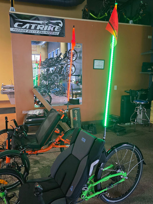 Glowwhips 4ft Bicycle Light Kit, mounted on trikes