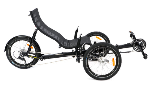 Greenspeed Magnum XL recumbent trike with dark gray frame with yellow decals, black wheels, boom, and seat. Right profile view