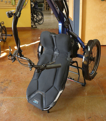 Image of a HP Velotechnik Delta trike tipped back onto its seat and rack using the stand-up feet kit. 