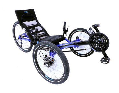 Front right angle studio view of blue recumbent trike with two twenty inch front wheels and a twenty-six inch back wheel.