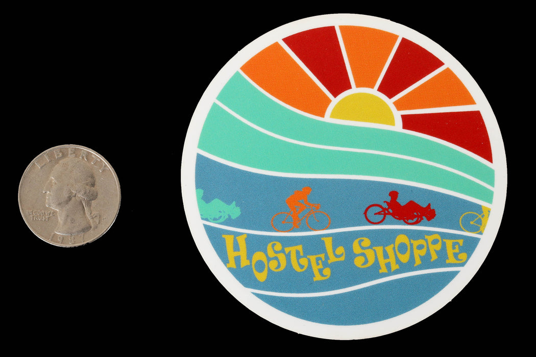 Hostel Shoppe Retro Sunset Bike and Trike Decal studio image with quarter for scale