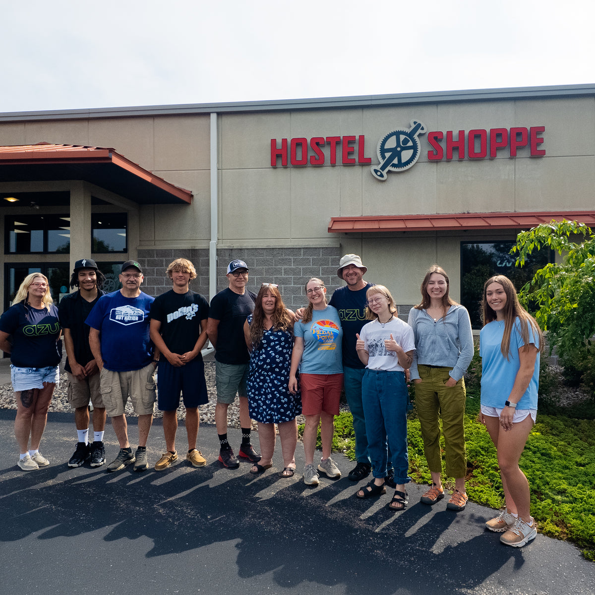 Hostel Shoppe staff stand in front of the store.