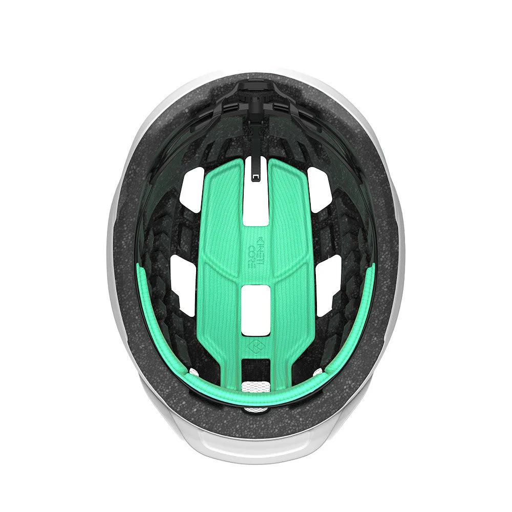 Studio inside view of a bicycle helmet with black foam and mint green padding.