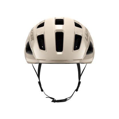 Studio front view of an off-white bicycle helmet with black chin straps and four rows of venting across top of helmet.