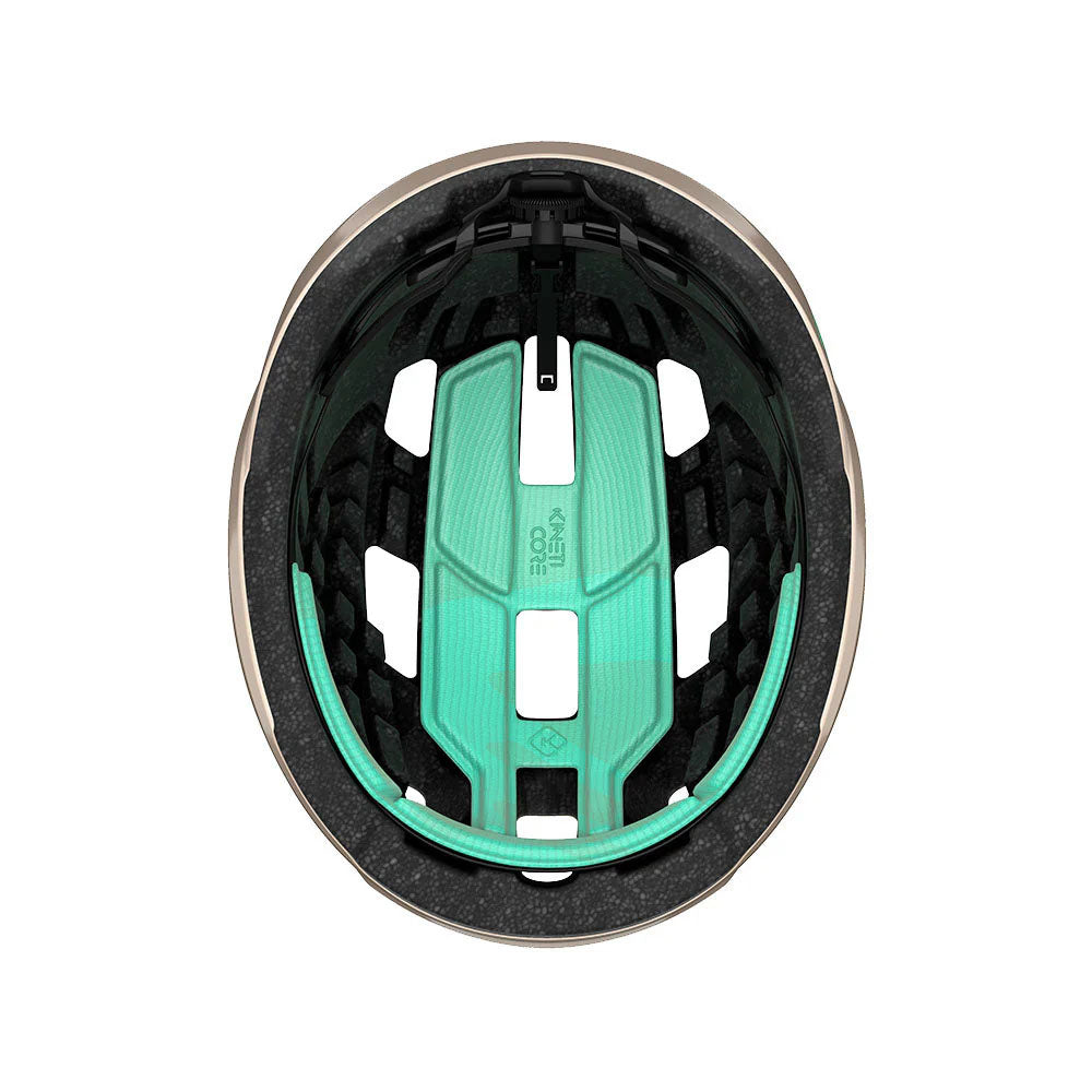 Studio inside view of a bicycle helmet with black foam and mint padded inserts. 