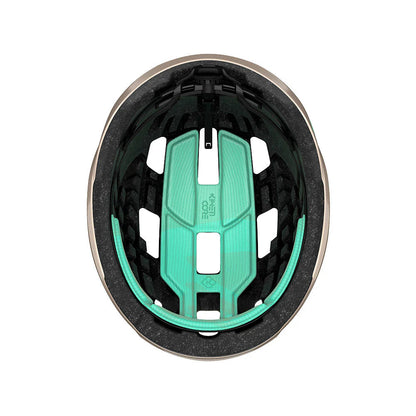 Studio inside view of a bicycle helmet with black foam and mint padded inserts. 