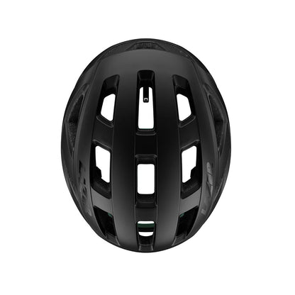 Studio top view of a matt black bicycle helmet with three rows of venting along the top. 