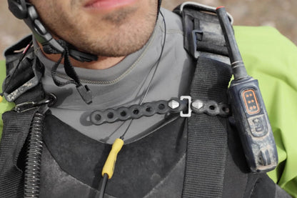 Modl 8" Infinity Tools 4 Pack black being used to secure a walkie talkie to a backpack