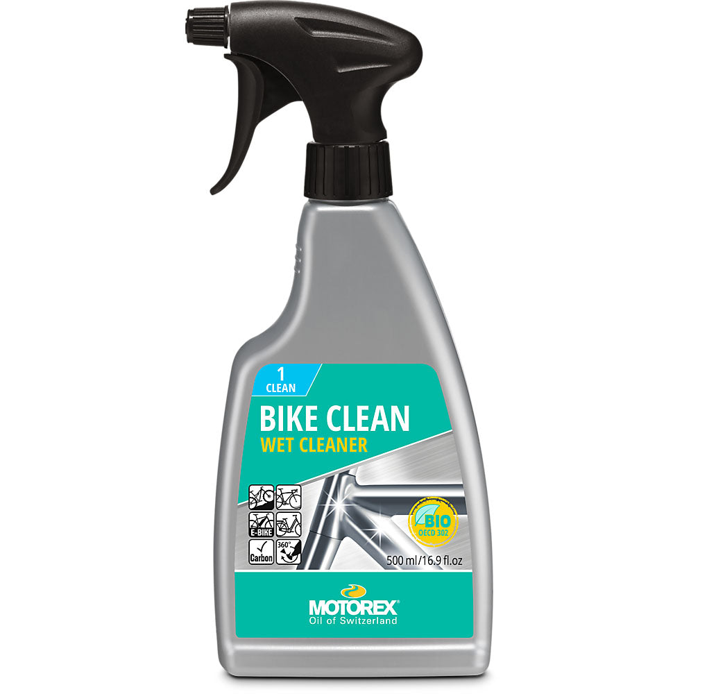 Studio view of silver spray bottle with green label and black nozzle of Motorex Bike Cleaner.