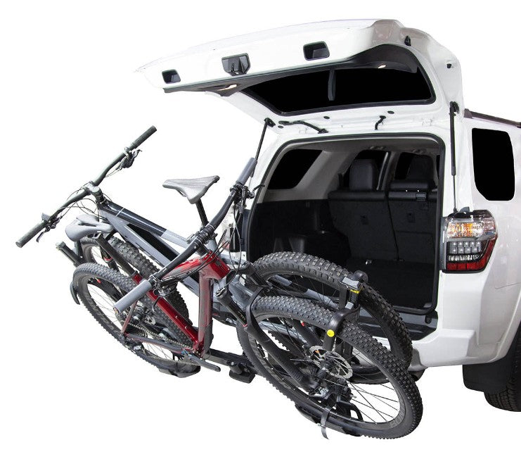 Saris SuperClamp EX 2 Bike Tray Hitch Car Rack On Vehicle with Bikes and Open Trunk Door Studio Image