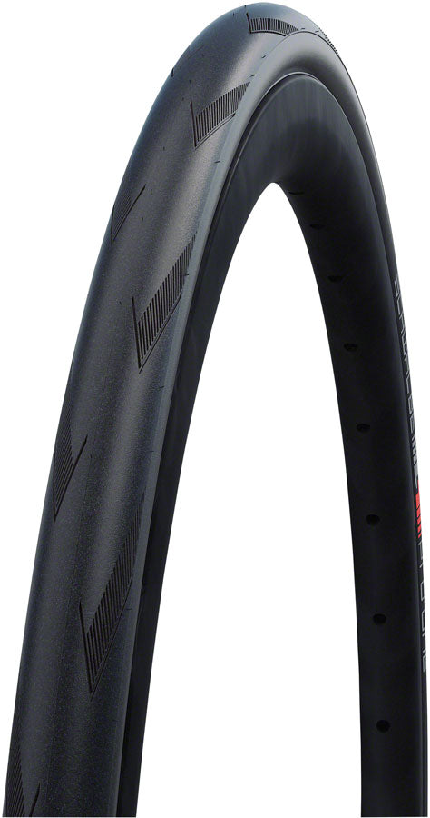 Black Schwalbe Pro One bicycle tire on a white background