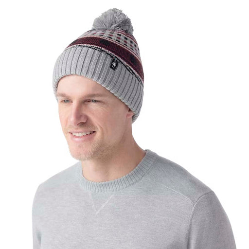 Smartwool Fairisle Fleece Lined Beanie in Light Gray Heather, studio front quarter view, with model