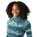 Smartwool Thermal Merino Reversible Pattern Neck Gaiter in twilight blue mountain scape, Studio photo shown on model