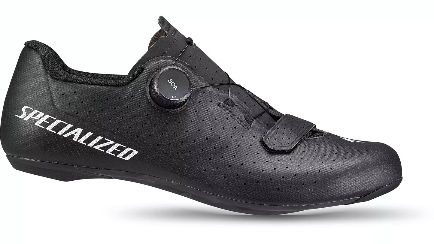 Studio side view of a black shoe with white Specialized lettering along outside of heel, a black hook and loop closure at the base of the toes and a boa dial fit adjustment at the top.