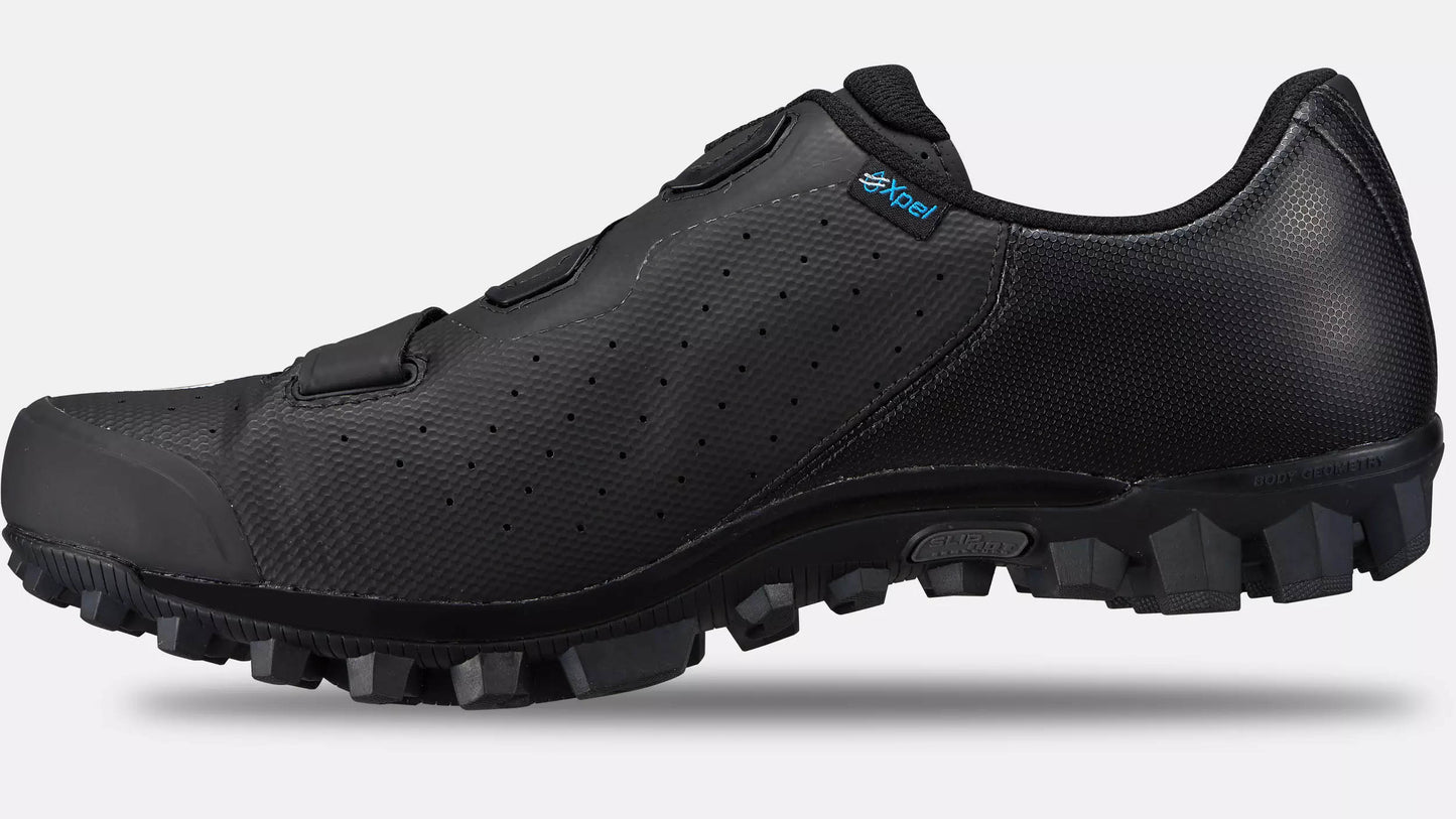 Studio image of the inner side of a black Specialized Recon 2.0 mountain bike shoe with black lugged sole.