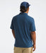 The North Face Mens Dune Sky Polo Shady Blue being worn by model studio imager back view