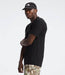 The North Face Mens Dune Sky S/S Crew TNF Black being worn by model halfbody studio image side view
