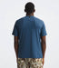The North Face Mens Dune Sky S/S Crew Shady Blue being worn by model halfbody studio image back view